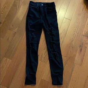 Skinny black ripped jeans